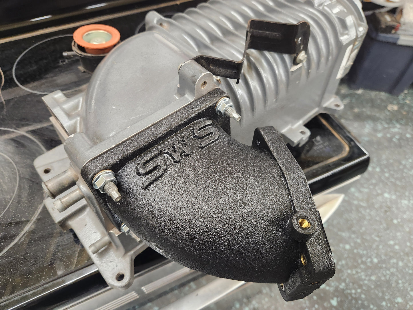 Supercharger throttle body adapters